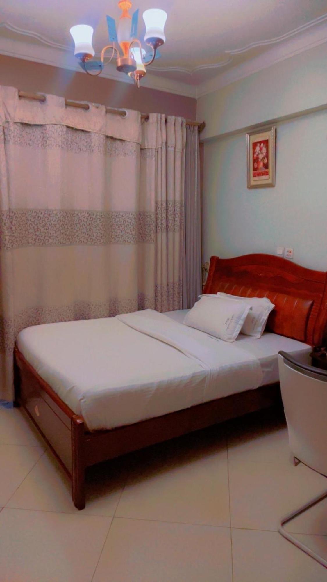 Super Paradise Hotel Kampala Extérieur photo